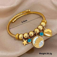 Gold Conch Shell Charm Bangle