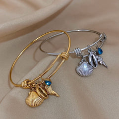 Gold Conch Shell Charm Bangle