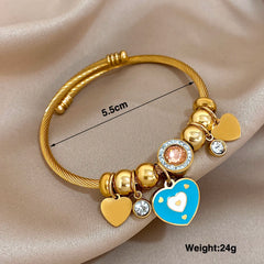 Gold Conch Shell Charm Bangle